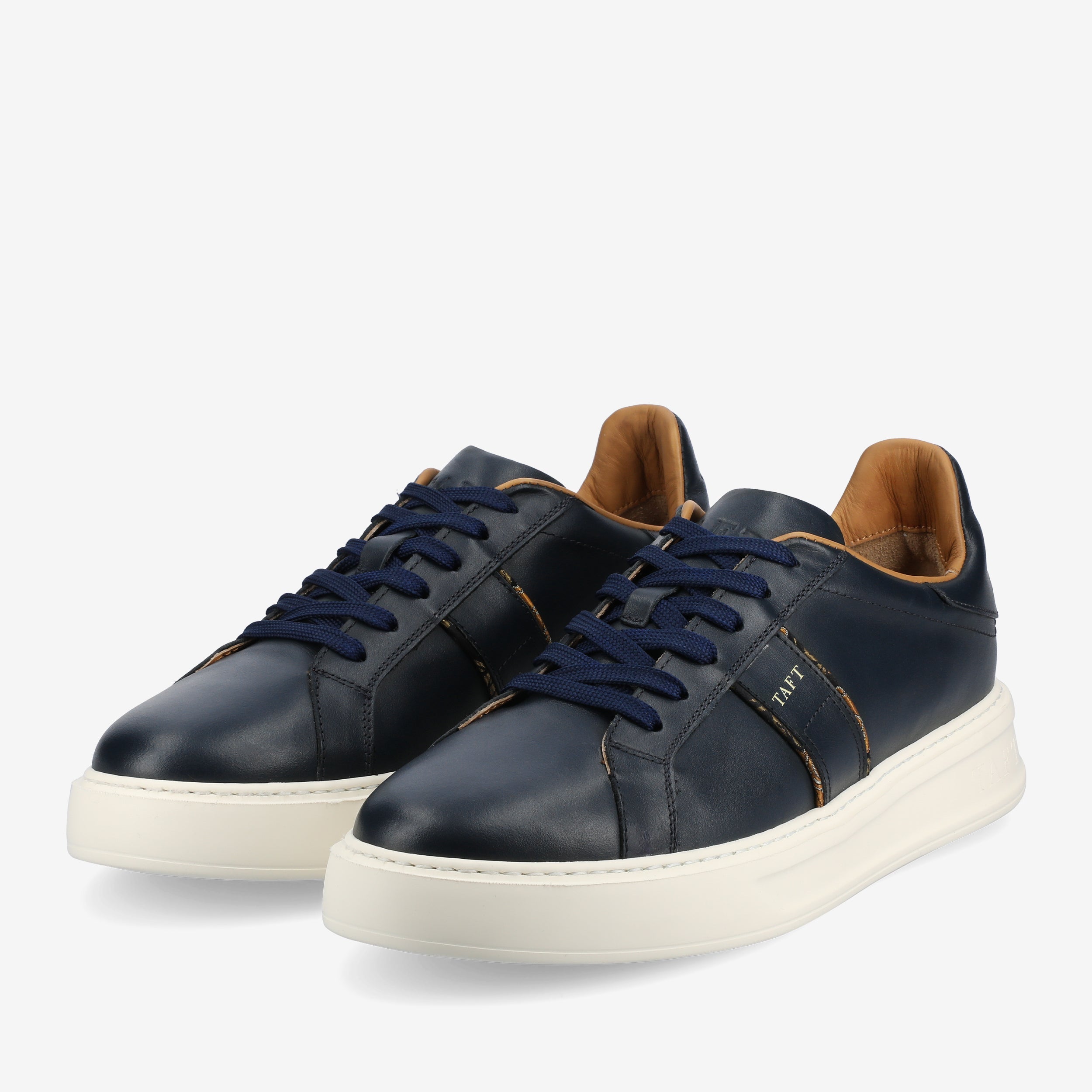 The Logan Sneaker in Navy